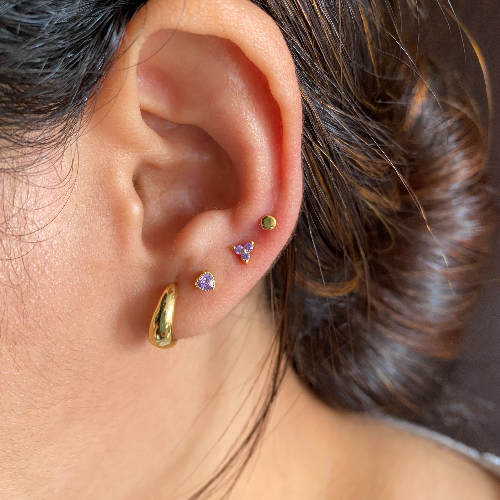 Piercing lovit lila